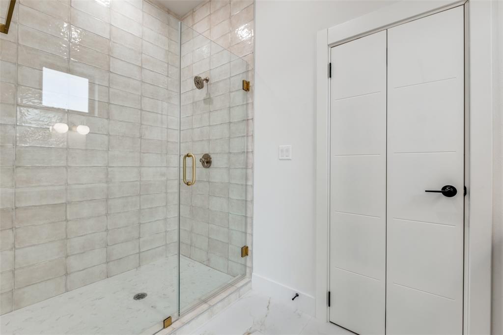 2613 Calvin Street, Unit 12 Dallas, TX 75204 - Photo 17 of 23 a bathroom with a shower