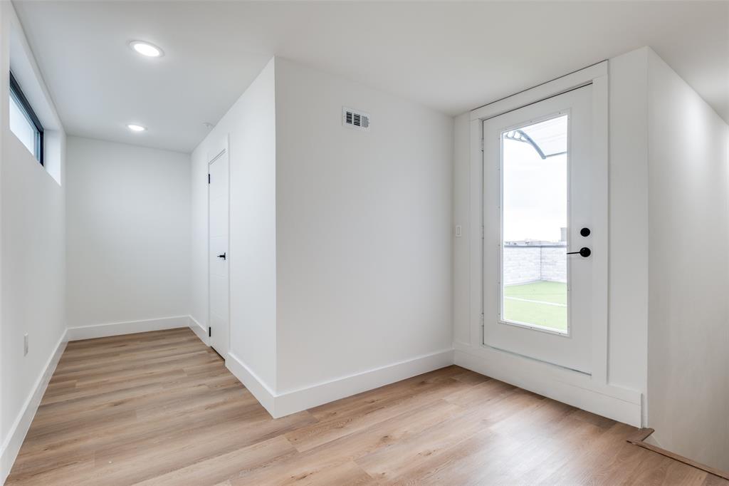 2613 Calvin Street, Unit 12 Dallas, TX 75204 - Photo 21 of 23 a view of an empty room and window
