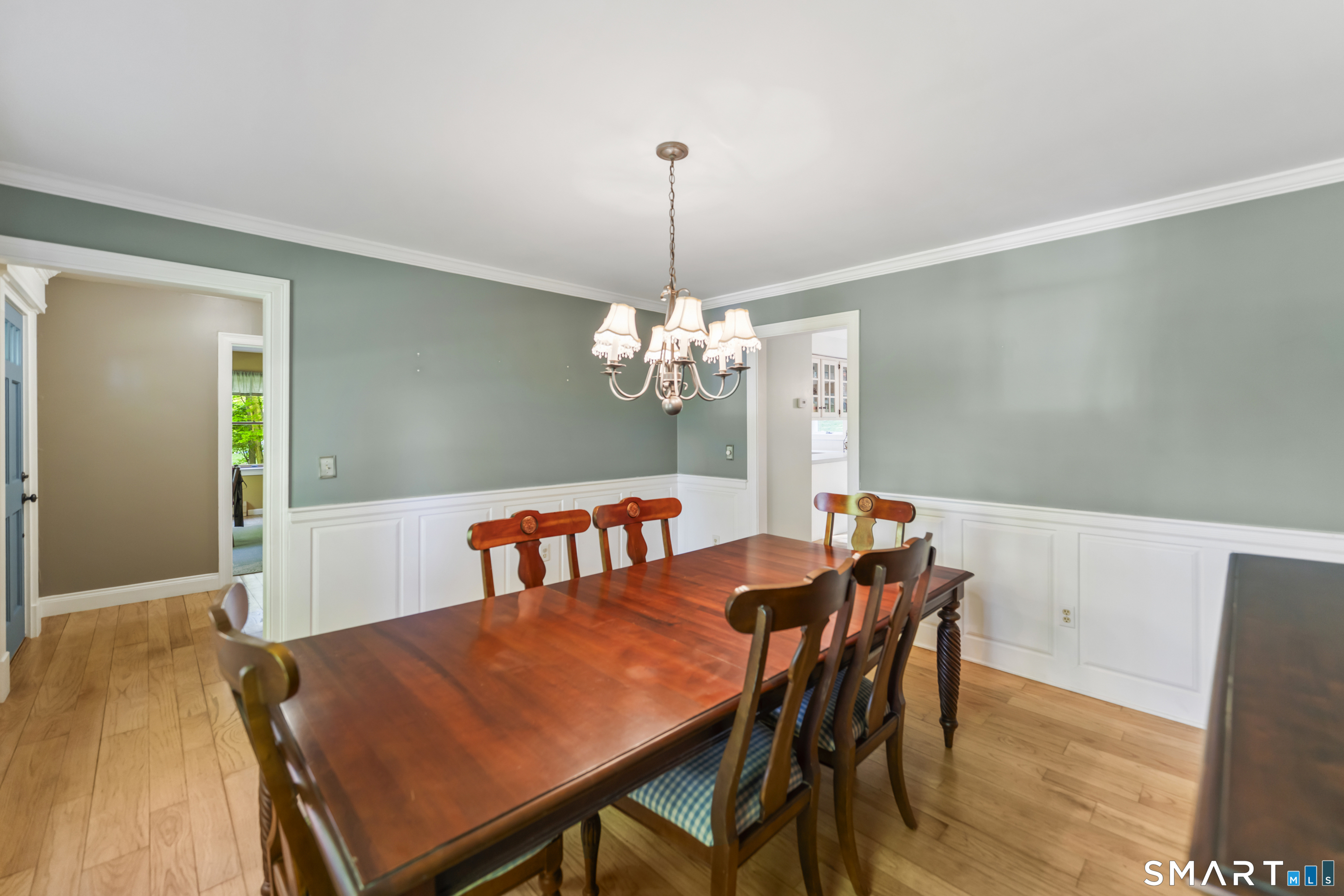 18 Gelding Hill Road Newtown, CT 06482 - Photo 11 of 40 a view of a dining room with furniture and wooden floor