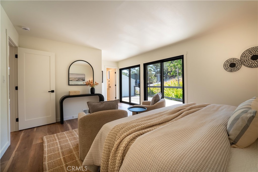 675 Huntington Road Cambria, CA 93428 - Photo 13 of 30 a bedroom with bed and a window