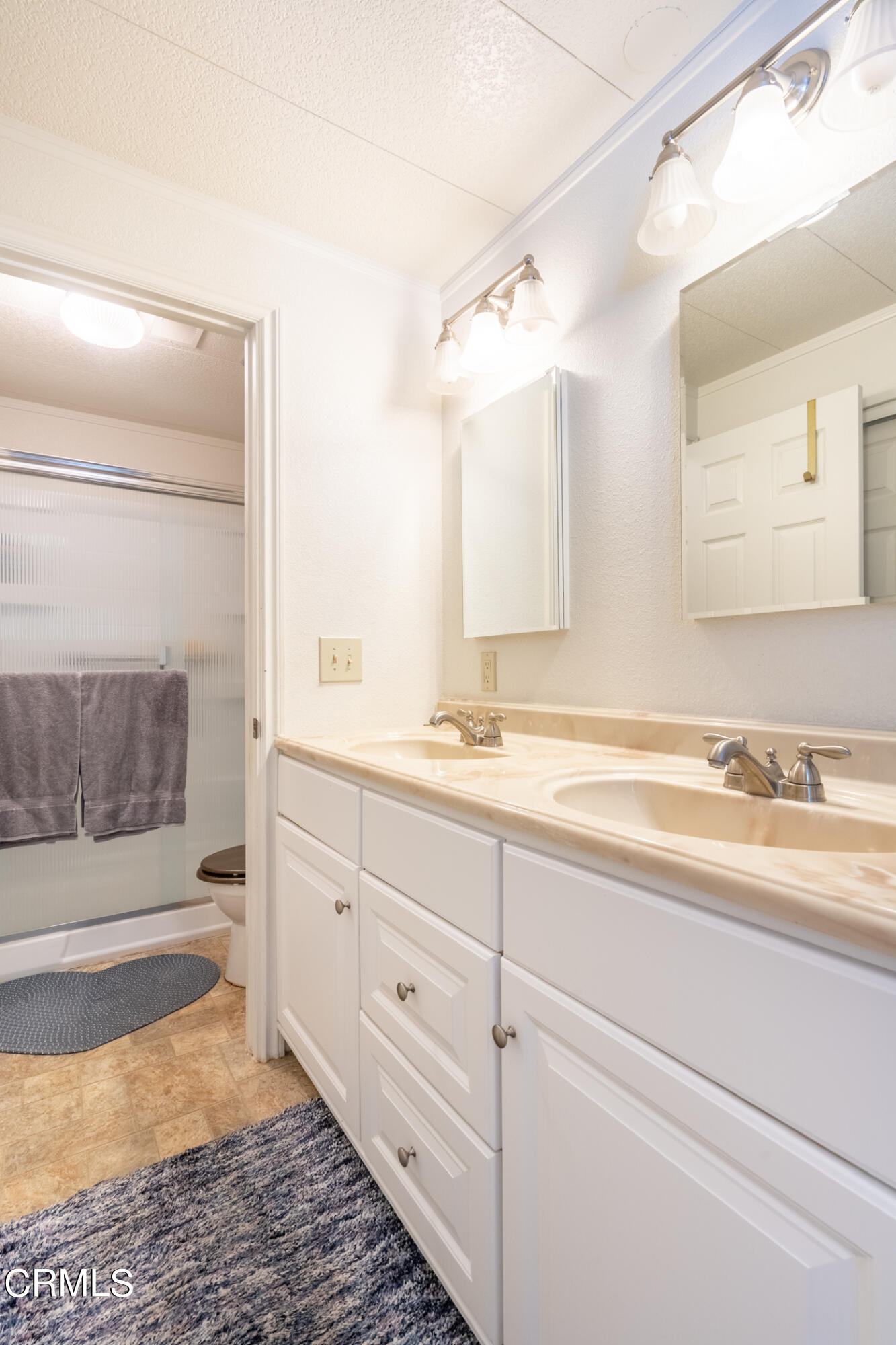 1225 South Rice Road, Unit 63 Ojai, CA 93023 - Photo 16 of 23 a bathroom with a sink a toilet and a bathtub