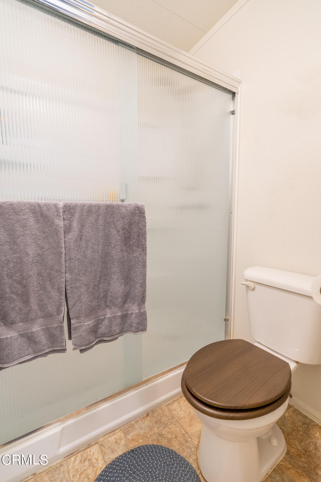 1225 South Rice Road, Unit 63 Ojai, CA 93023 - Photo 17 of 23 a bathroom with a toilet and a vanity