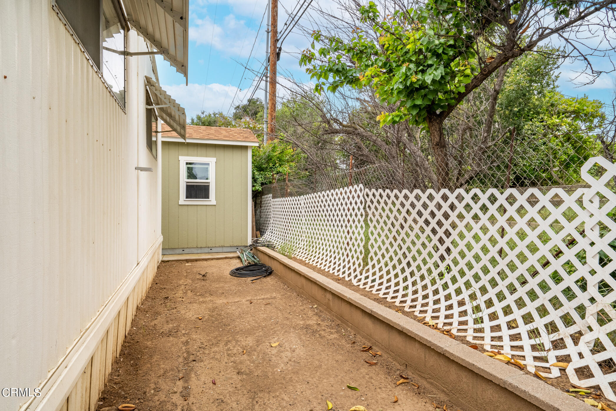 1225 South Rice Road, Unit 63 Ojai, CA 93023 - Photo 23 of 23 a view of a black gate