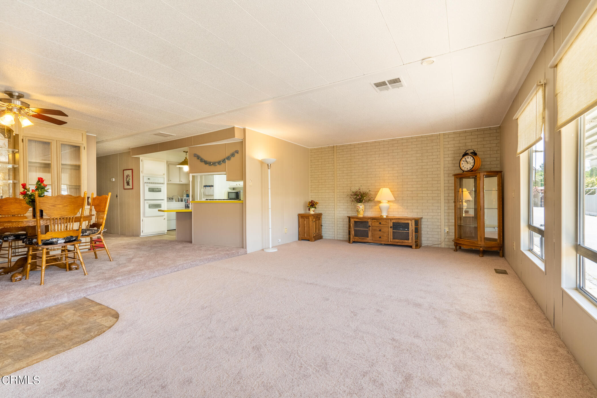 1225 South Rice Road, Unit 63 Ojai, CA 93023 - Photo 3 of 23 a view of a livingroom with furniture and an empty room