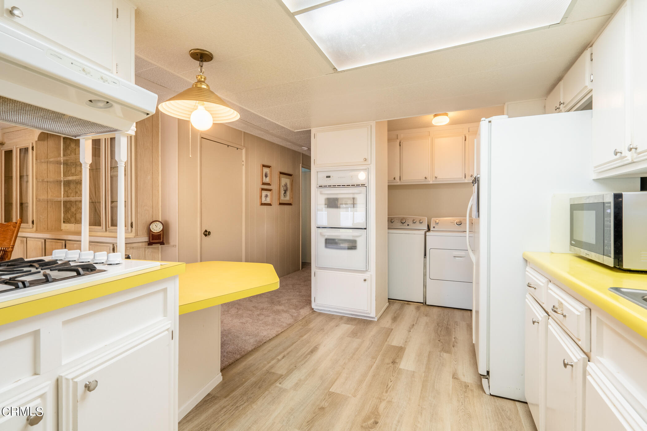 1225 South Rice Road, Unit 63 Ojai, CA 93023 - Photo 7 of 23 a room with a bed and a flat screen tv