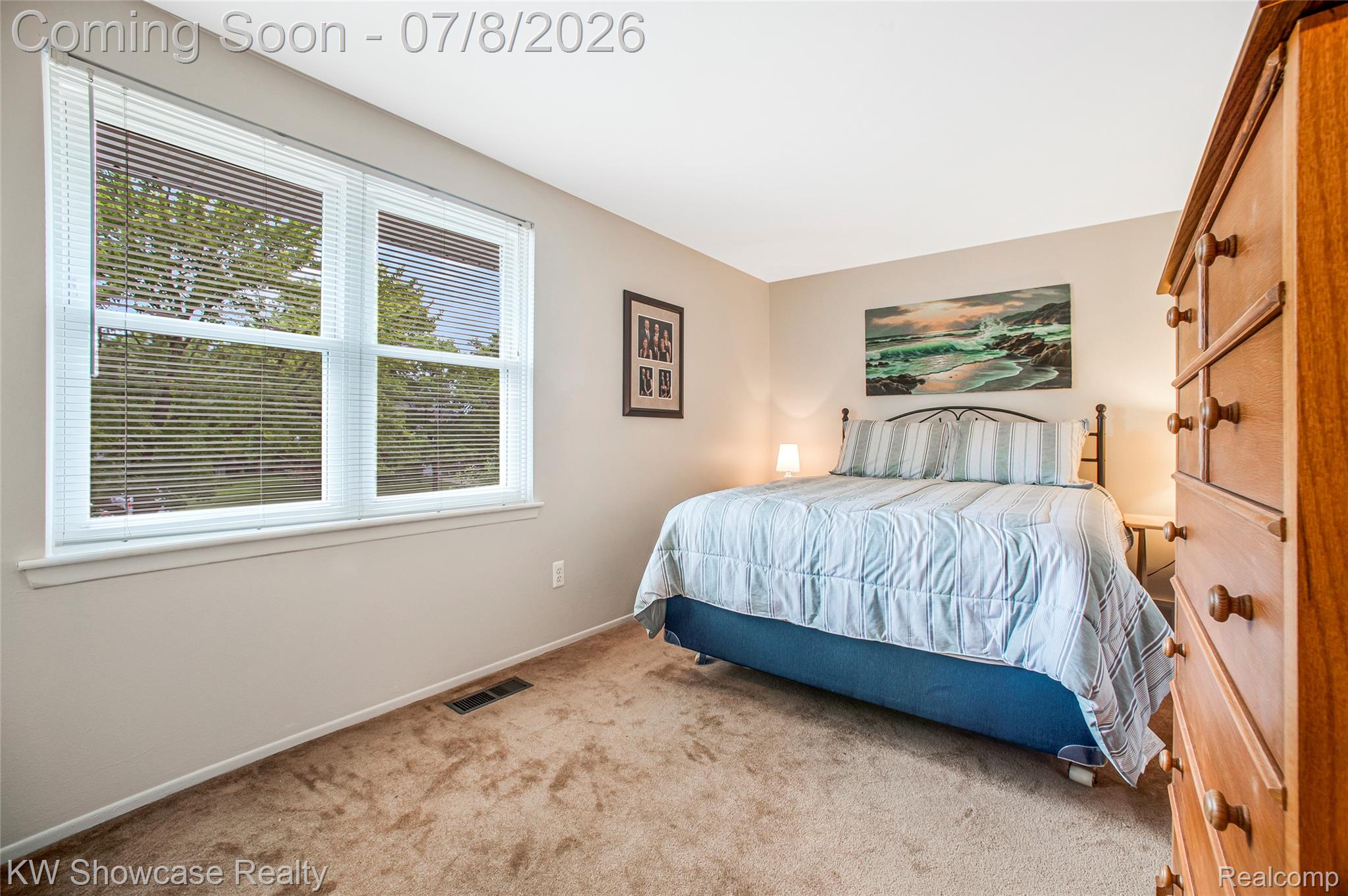 16720 Wayne Road Livonia, MI 48154 - Photo 17 of 29 Carpeted room featuring a double window with blinds