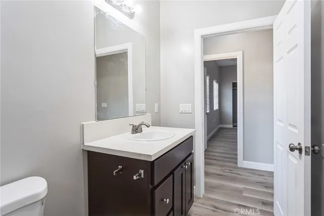 a bathroom with a sink a mirror and a shower