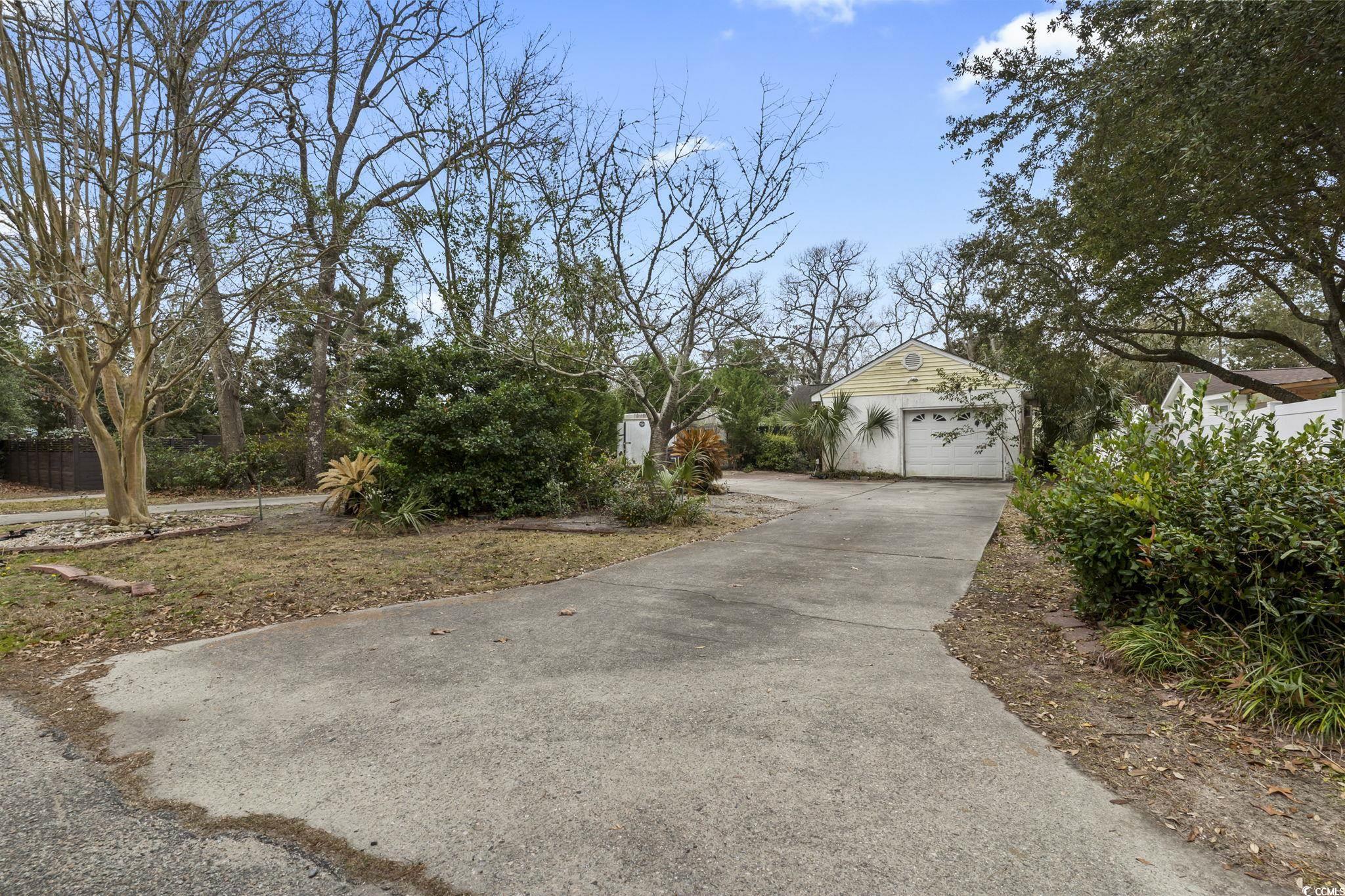 408 Sunset Trail Myrtle Beach, SC 29577 - Photo 7 of 24 Rear parking off South Highland - Curved Drive