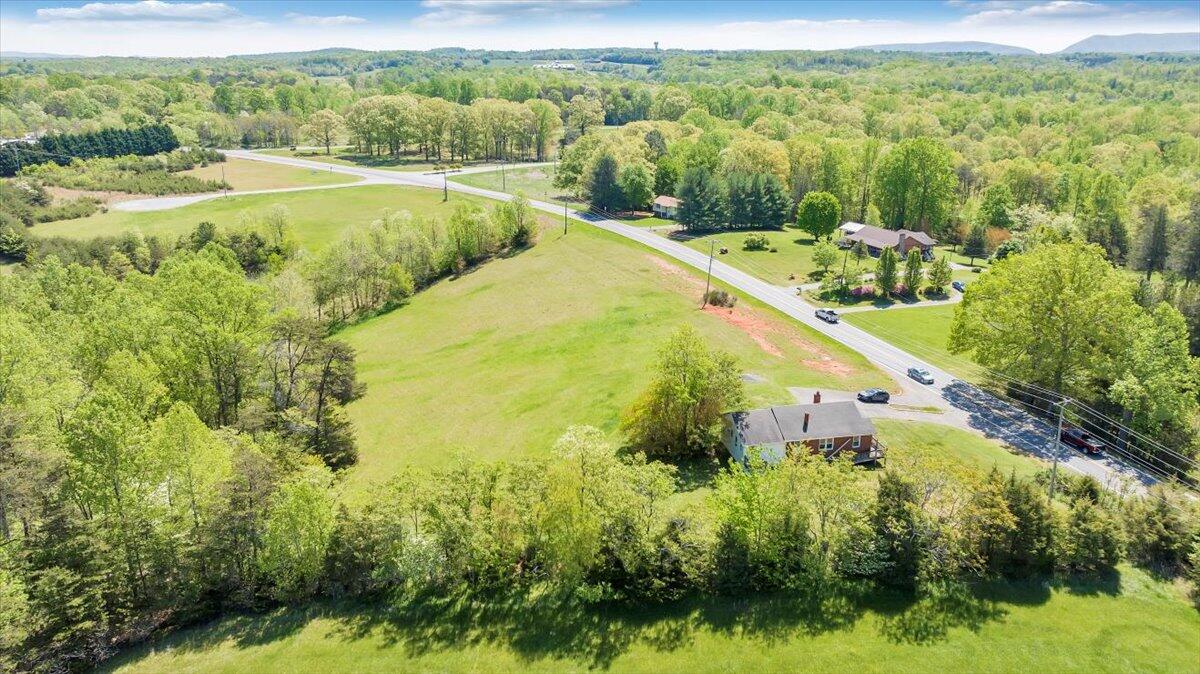15723 Moneta Road Moneta, VA 24121 - Photo 13 of 38 a view of a lake with a yard