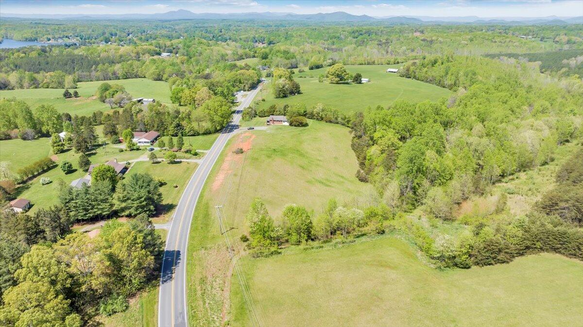 15723 Moneta Road Moneta, VA 24121 - Photo 19 of 38 an aerial view of residential houses with outdoor space and trees
