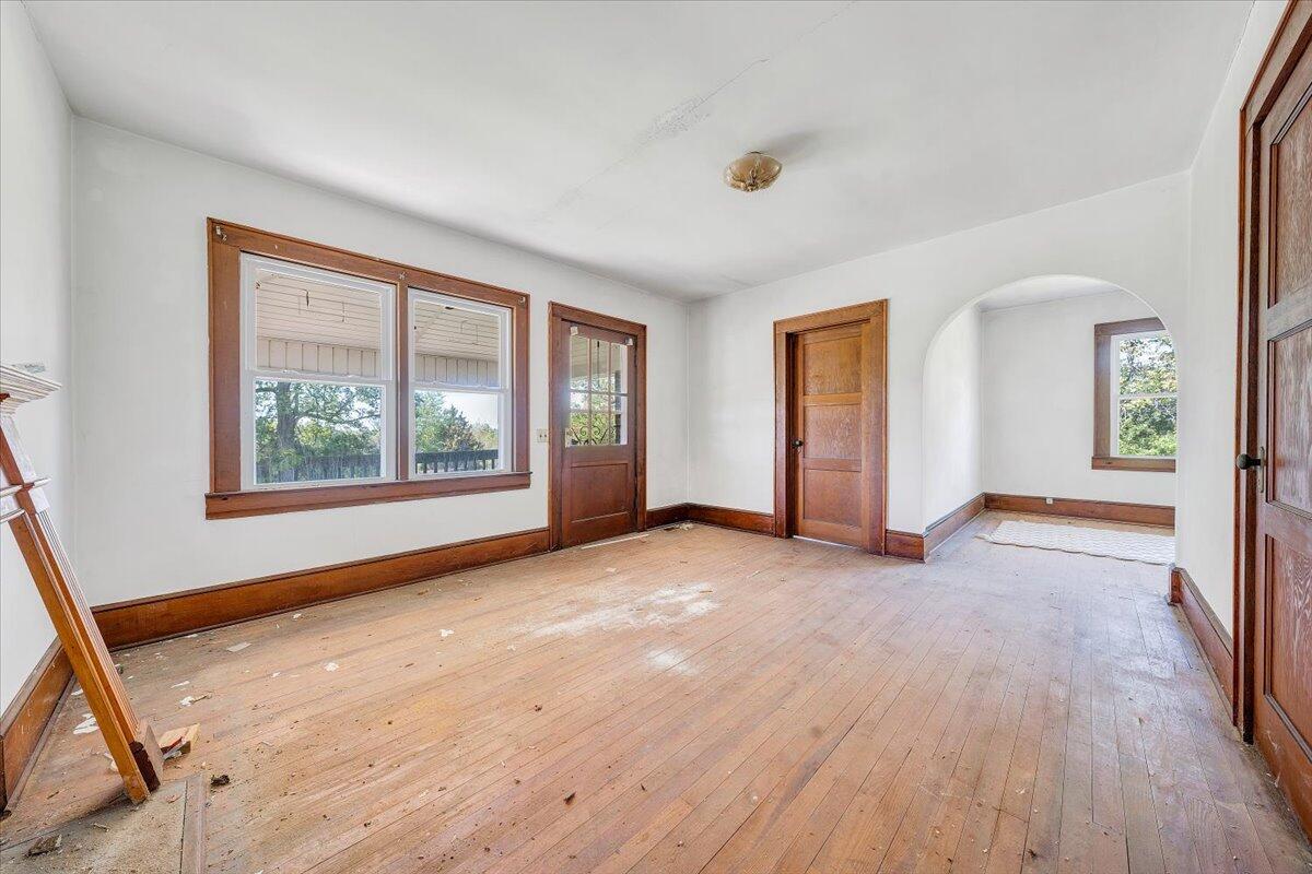 15723 Moneta Road Moneta, VA 24121 - Photo 25 of 38 a view of an empty room with a window and wooden floor