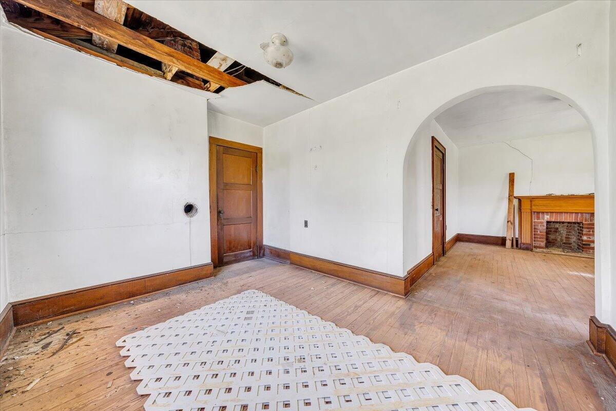 15723 Moneta Road Moneta, VA 24121 - Photo 27 of 38 a view of a big room with wooden floor and windows