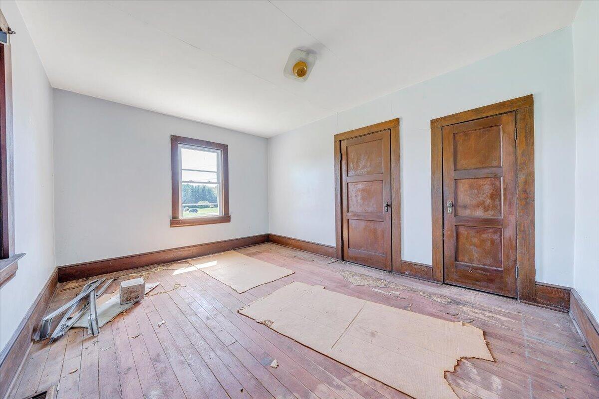 15723 Moneta Road Moneta, VA 24121 - Photo 30 of 38 wooden floor in an empty room with a window