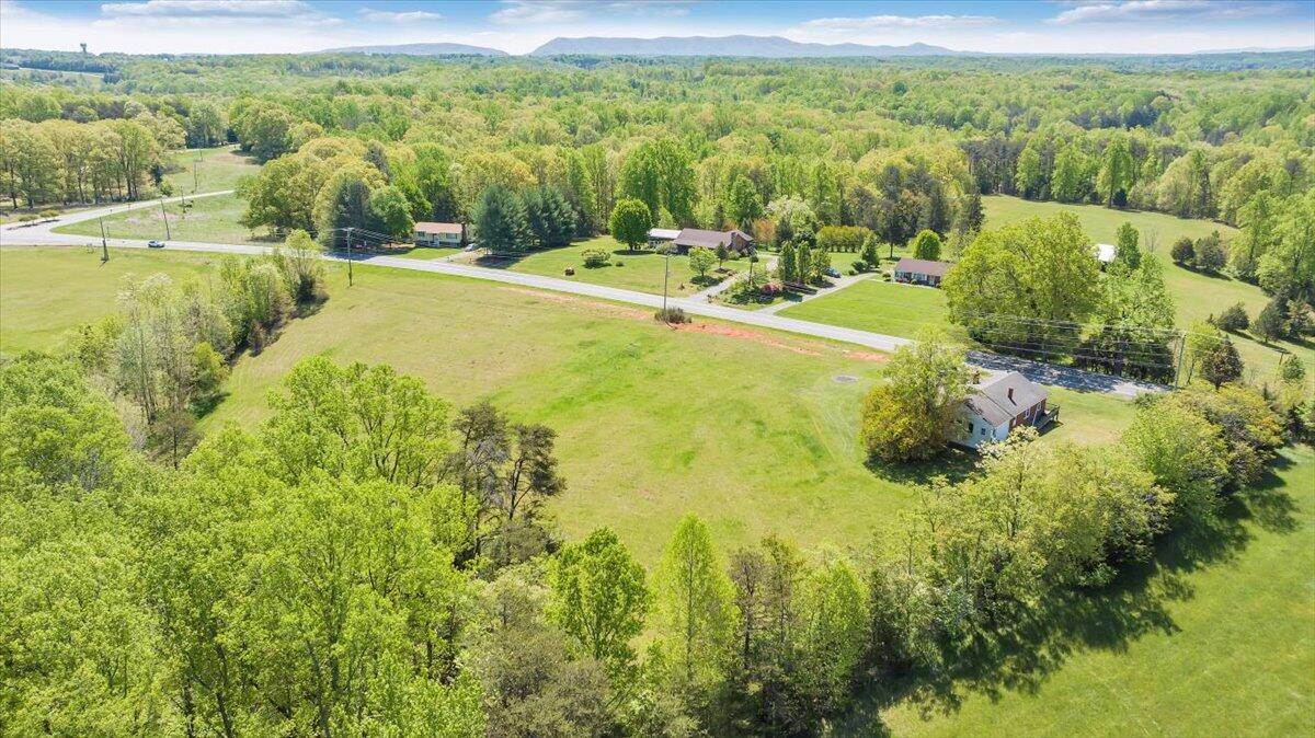 15723 Moneta Road Moneta, VA 24121 - Photo 3 of 38 a view of a yard with an outdoor space