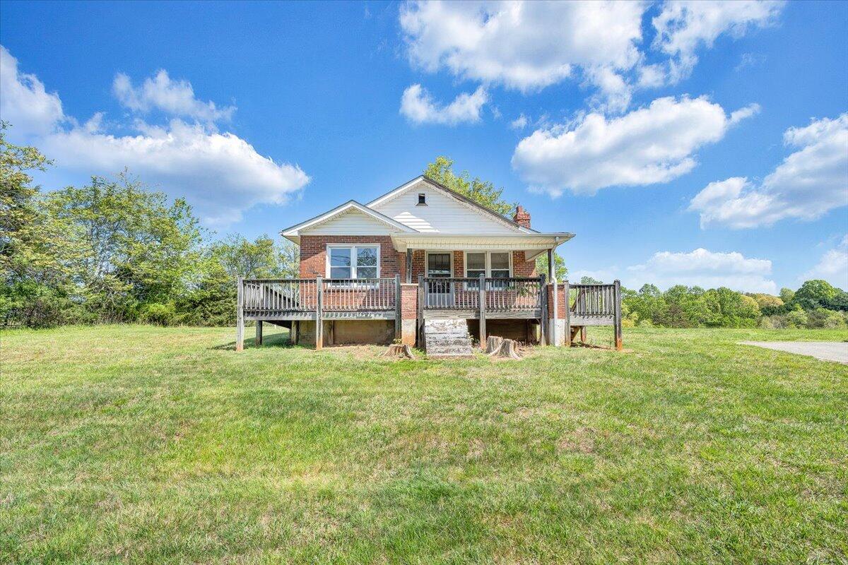 15723 Moneta Road Moneta, VA 24121 - Photo 34 of 38 a view of a house with a yard porch and sitting area