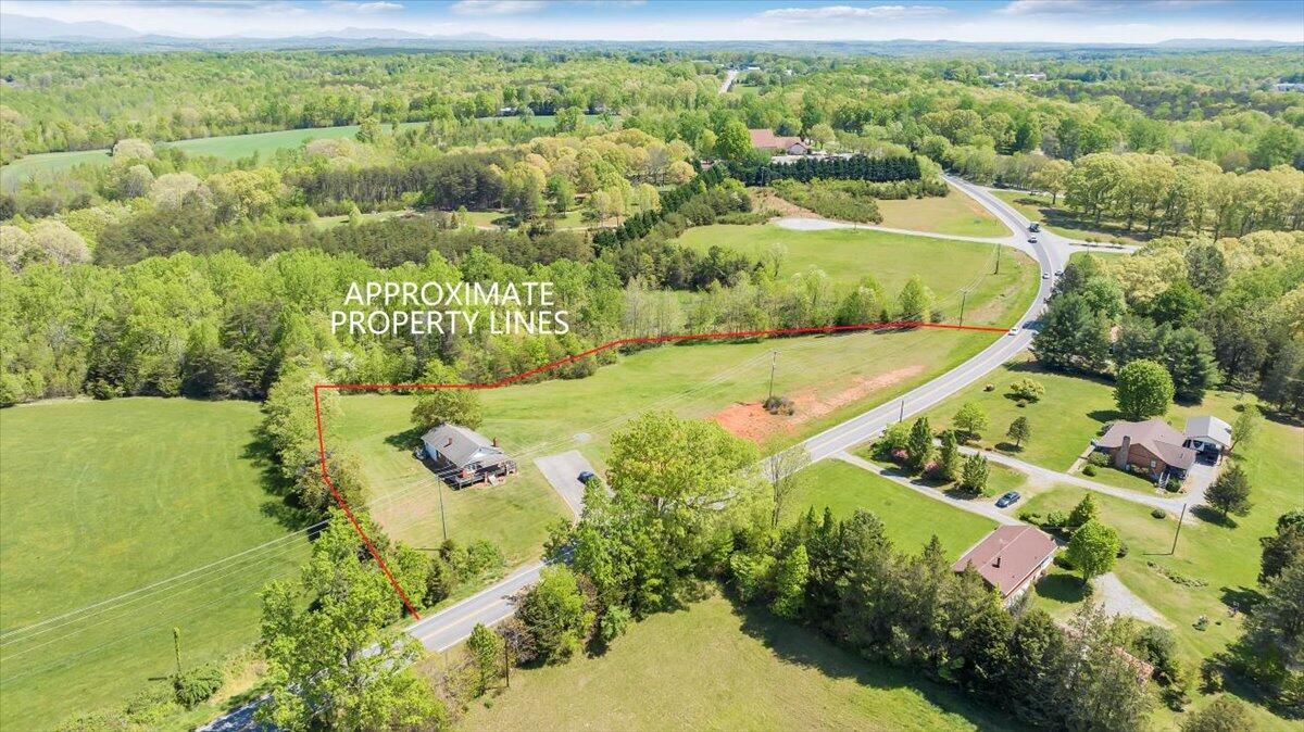 15723 Moneta Road Moneta, VA 24121 - Photo 4 of 38 a view of a garden with an outdoor space