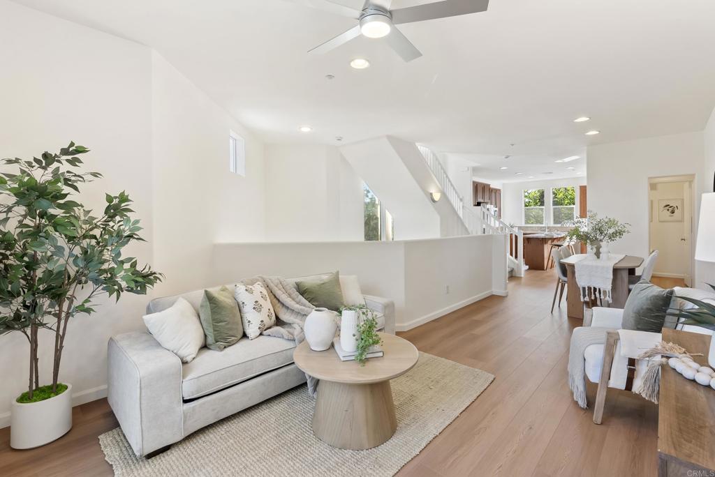 1276 San Elijo Road North San Marcos, CA 92078 - Photo 15 of 35 a living room with furniture and a potted plant