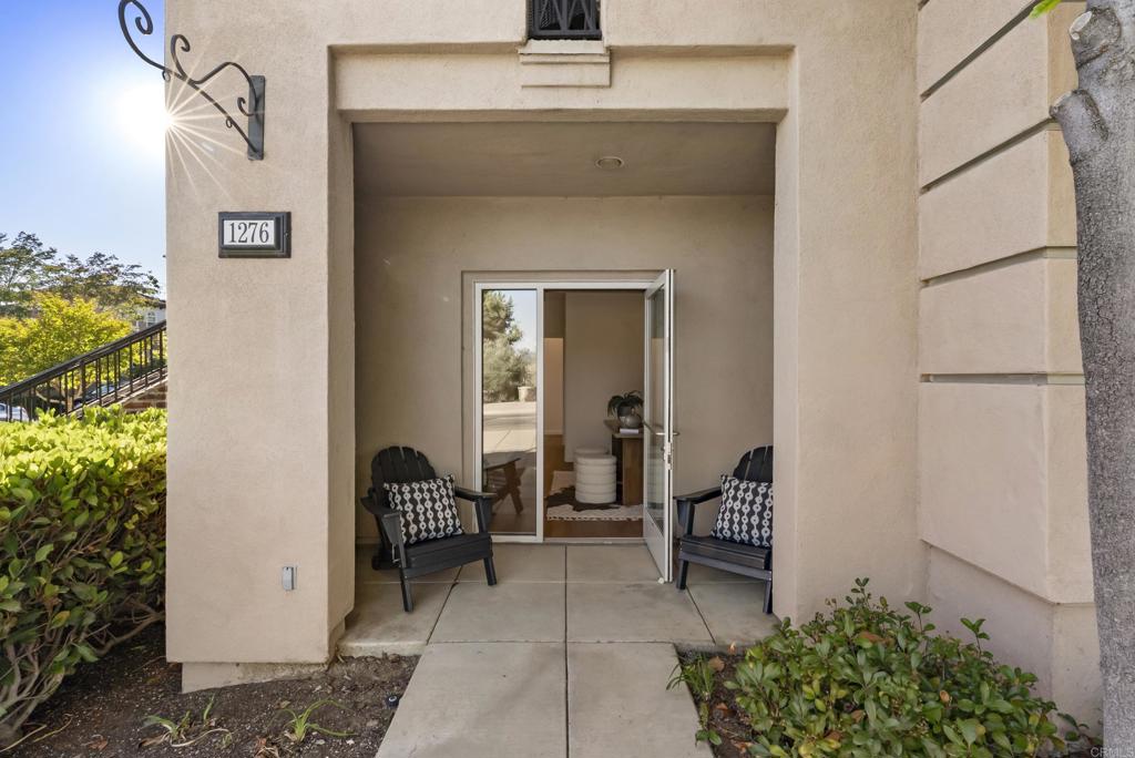 1276 San Elijo Road North San Marcos, CA 92078 - Photo 17 of 35 a living room with furniture and a potted plant