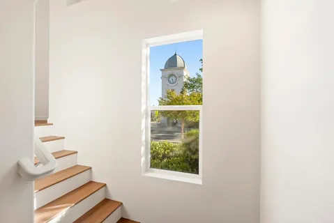 a view of storage and utility room with washer and dryer