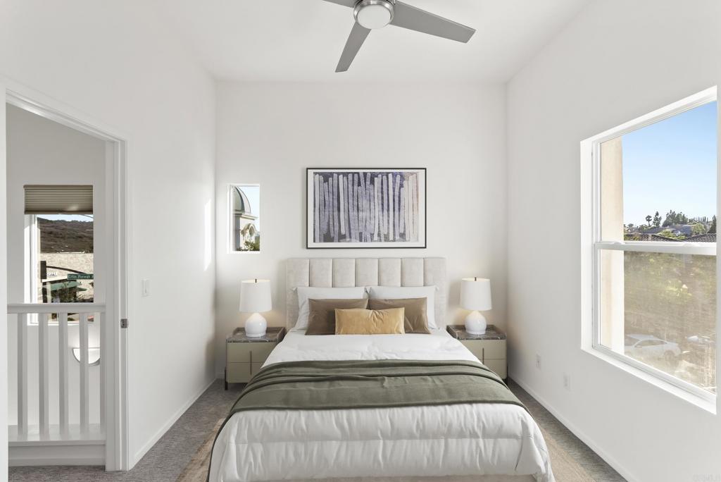 1276 San Elijo Road North San Marcos, CA 92078 - Photo 21 of 35 a bedroom with a large bed and a window