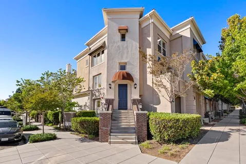a front view of a building with street view