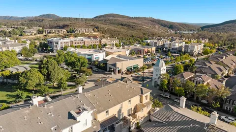 a view of swimming pool from a lake view