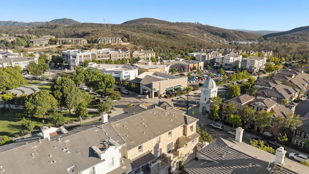 1276 San Elijo Road North San Marcos, CA 92078 - Photo 28 of 35 an aerial view of residential house with parking and trees
