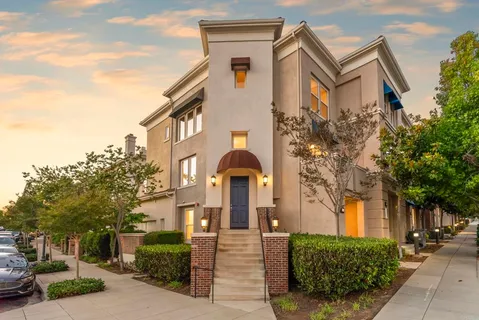 a front view of a building with street view