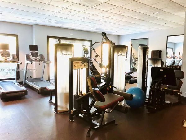 a view of a room with gym equipment