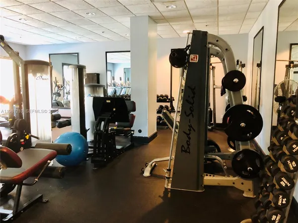 a view of a room with gym equipment