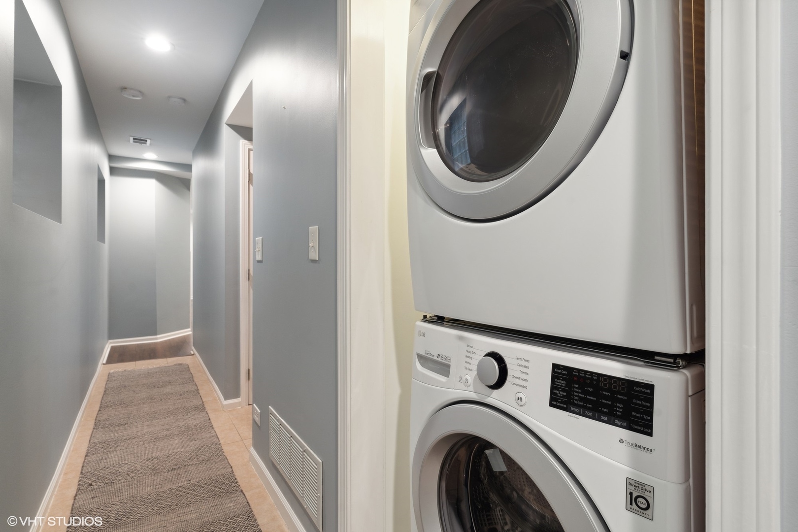1372 North Dean Street, Unit 1 Chicago, IL 60622 - Photo 19 of 26 a view of a hallway with washer and dryer