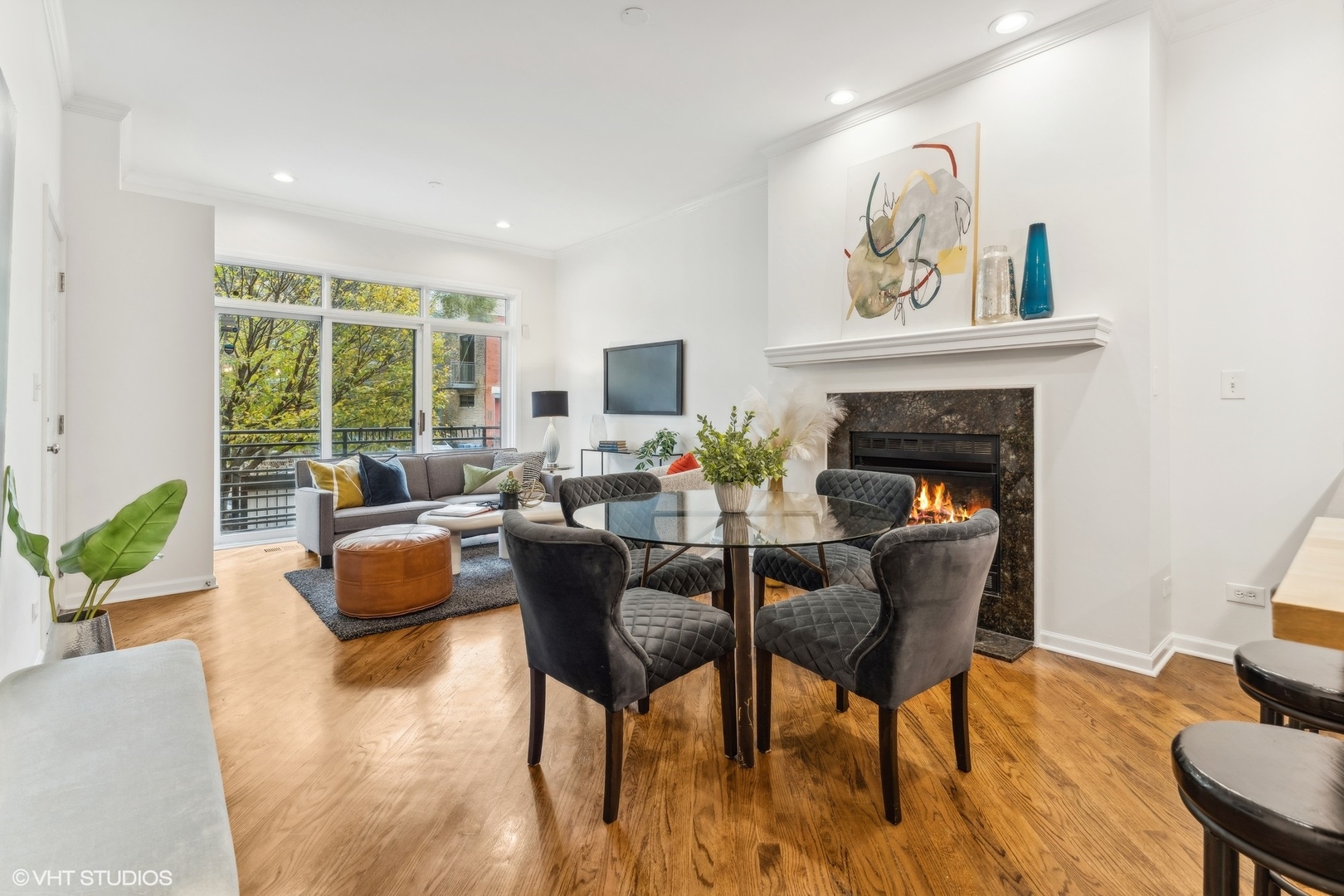 1372 North Dean Street, Unit 1 Chicago, IL 60622 - Photo 2 of 26 a living room with furniture and a fireplace