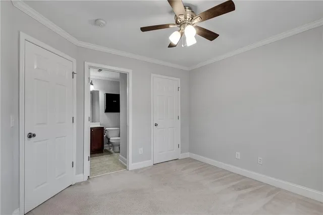 a view of a livingroom with a fireplace and window