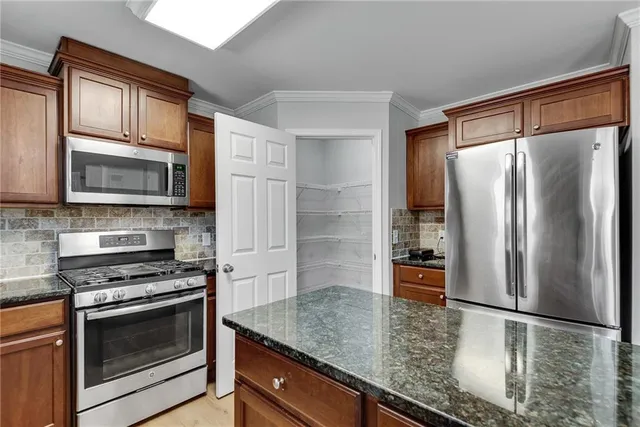 a view of a windows and a fireplace in a room