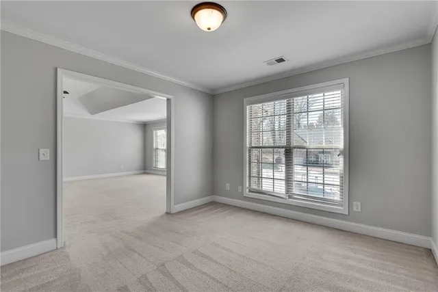 a spacious bathroom with a tub shower and sink