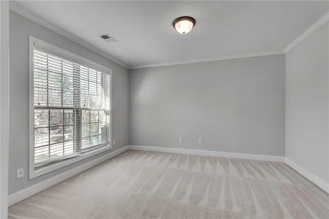 a spacious bathroom with a tub a double vanity sink and a large mirror