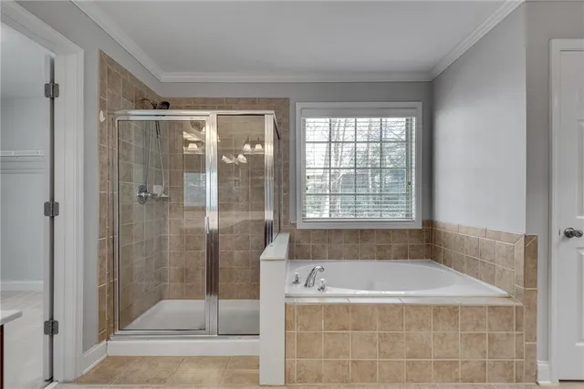 a bathroom with a granite countertop sink a mirror and a shower