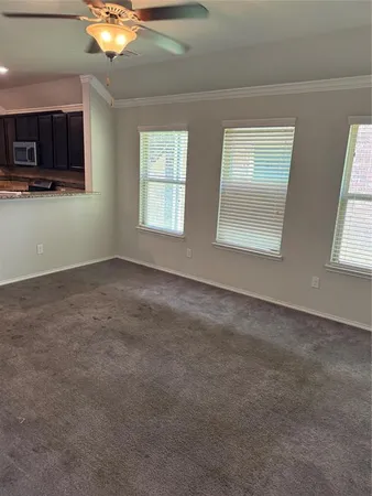 a kitchen with granite countertop stainless steel appliances a cabinets and a counter space