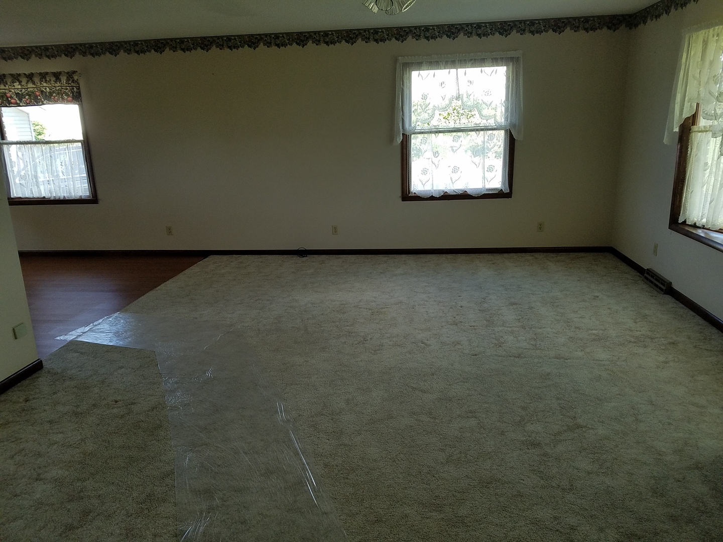 10730 East Fowler Road Rochelle, IL 61068 - Photo 2 of 37 a view of a room that has a window in it