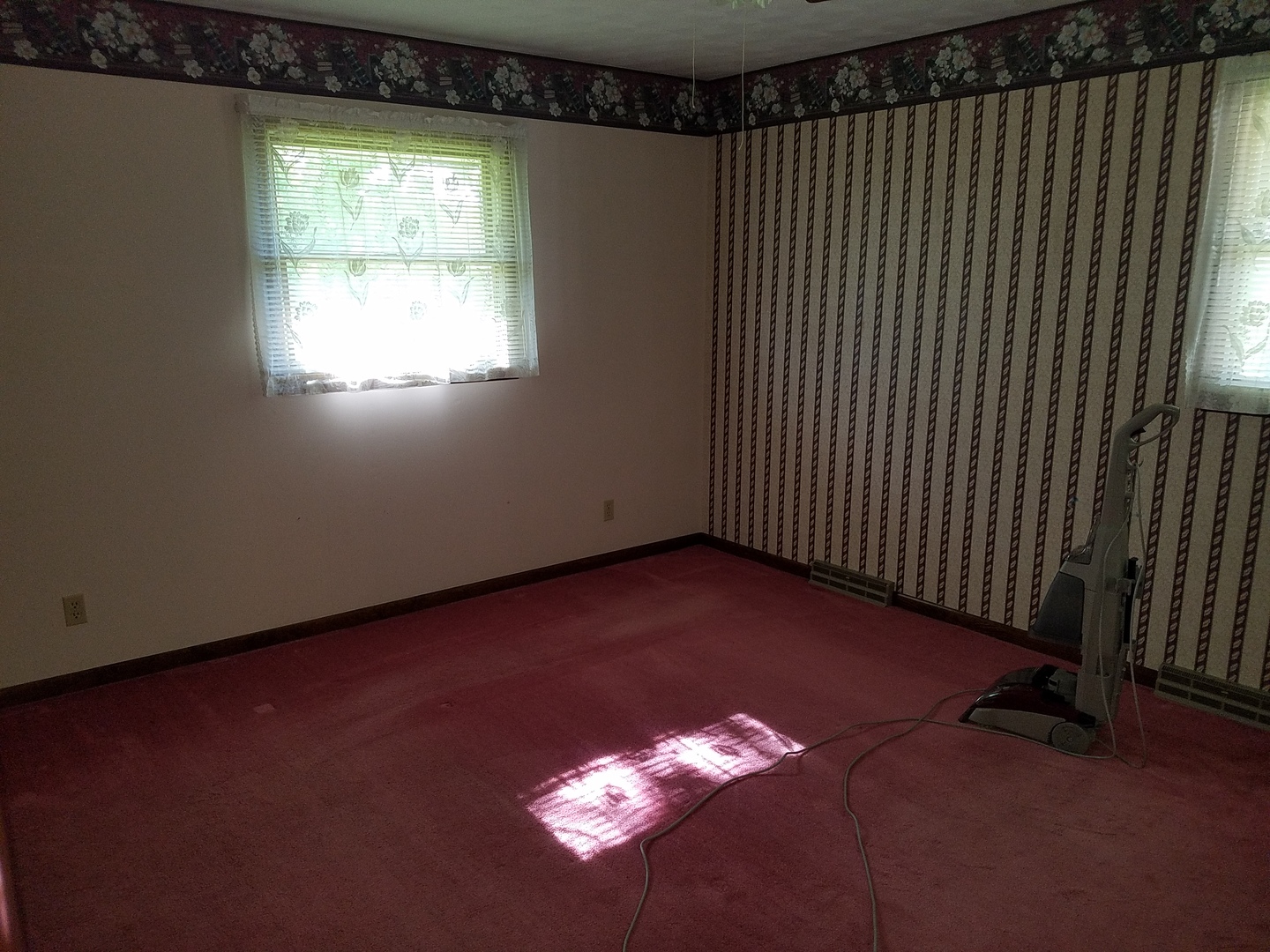 10730 East Fowler Road Rochelle, IL 61068 - Photo 14 of 37 an empty room with a window