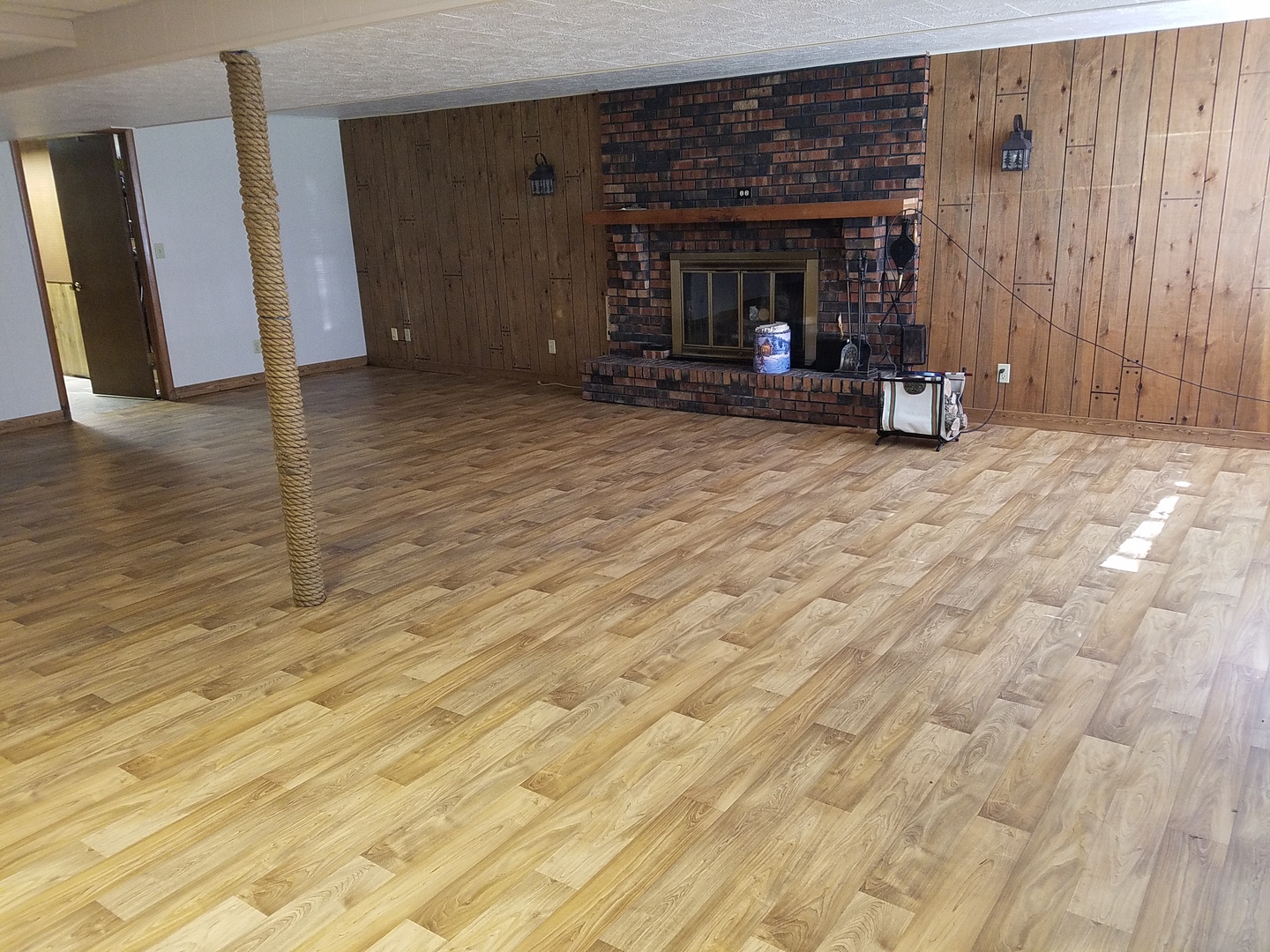 10730 East Fowler Road Rochelle, IL 61068 - Photo 18 of 37 a view of a livingroom with furniture and an empty room
