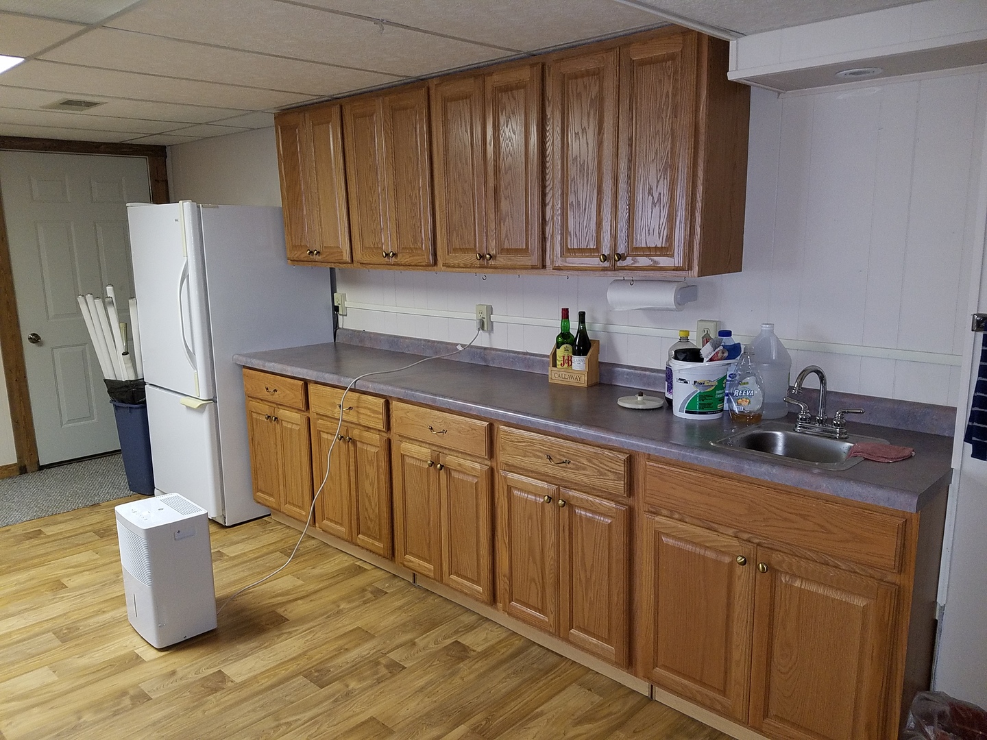 10730 East Fowler Road Rochelle, IL 61068 - Photo 19 of 37 a kitchen with stainless steel appliances granite countertop a sink a microwave a refrigerator and cabinets