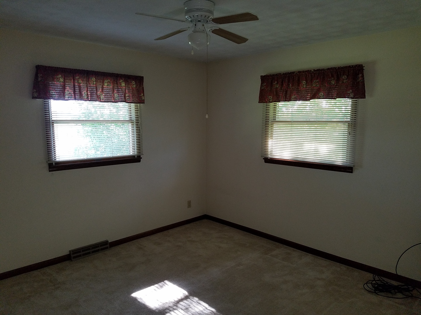 10730 East Fowler Road Rochelle, IL 61068 - Photo 10 of 37 an empty room with a window