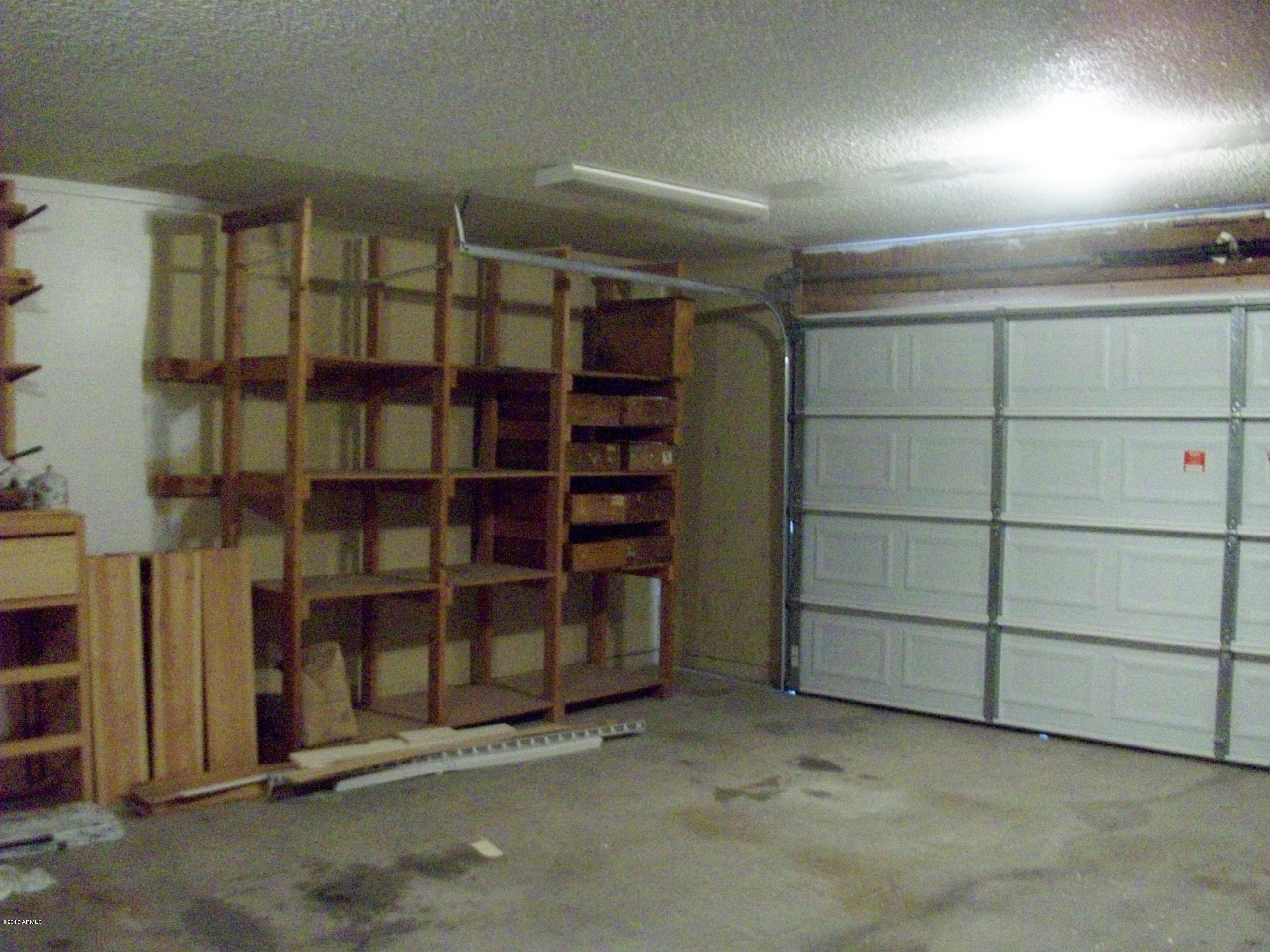 1724 West Utopia Road Phoenix, AZ 85027 - Photo 22 of 22 Shelving in garage
