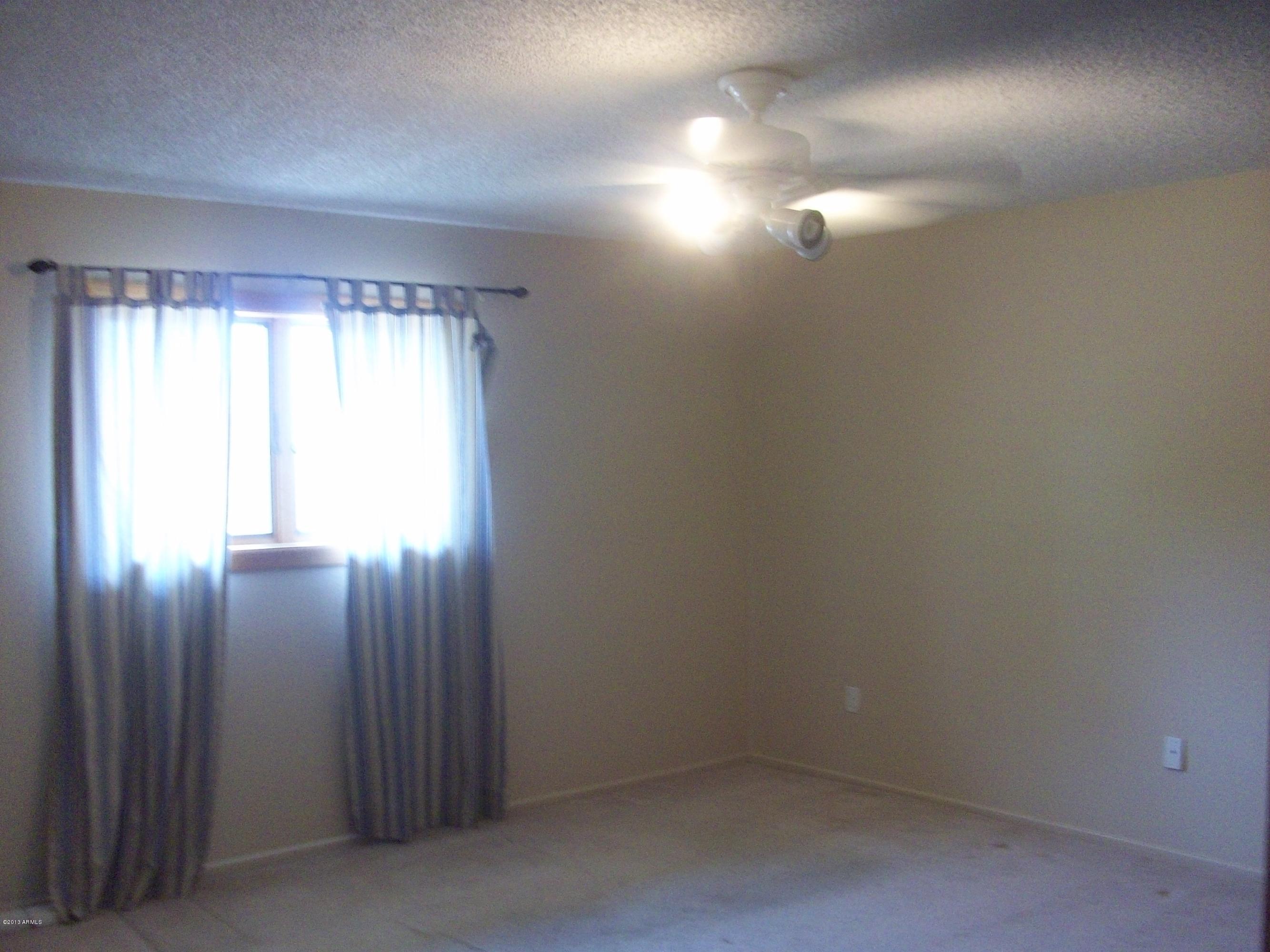 1724 West Utopia Road Phoenix, AZ 85027 - Photo 9 of 22 Master bedroom