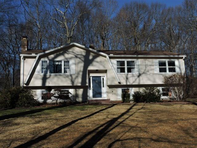 28 Highland Road Oxford, CT 06478 - Photo 1 of 1 a front view of a house with street