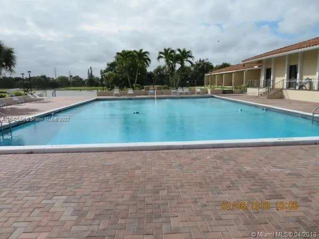 view of outdoor space with swimming pool and seating