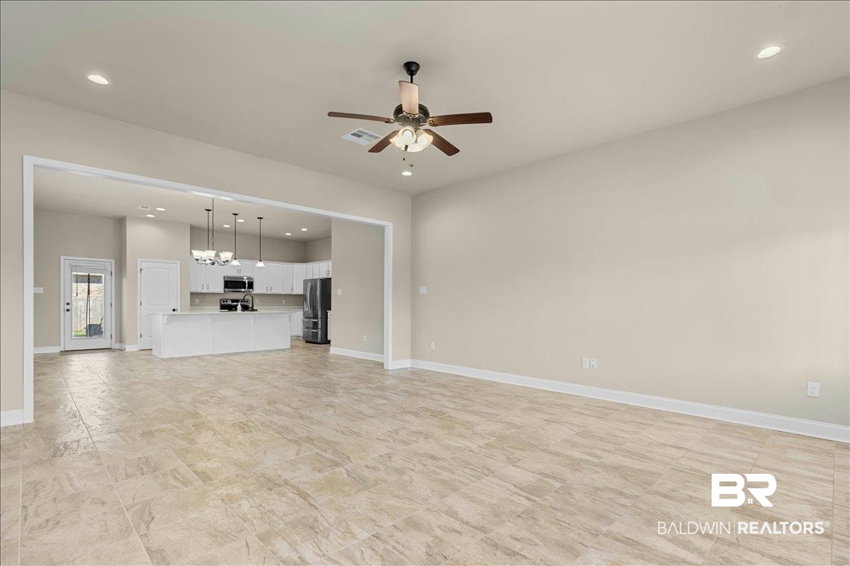 1112 Stella Road Foley, AL 36535 - Photo 6 of 33 Unfurnished living room with recessed lighting and a ceiling fan