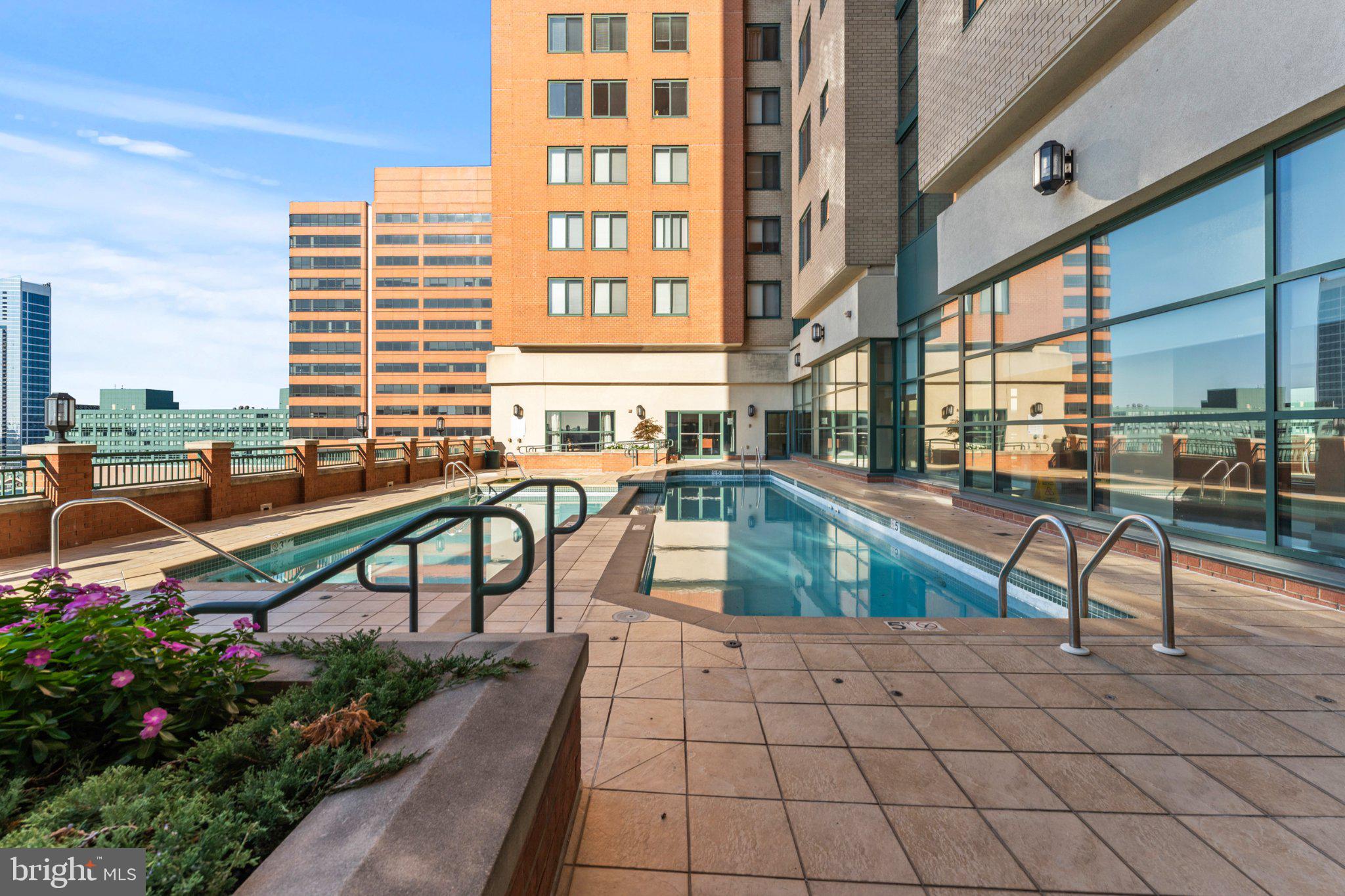 414 Water Street, Unit 1306 Baltimore, MD 21202 - Photo 3 of 29 Urban oasis with rooftop pool.