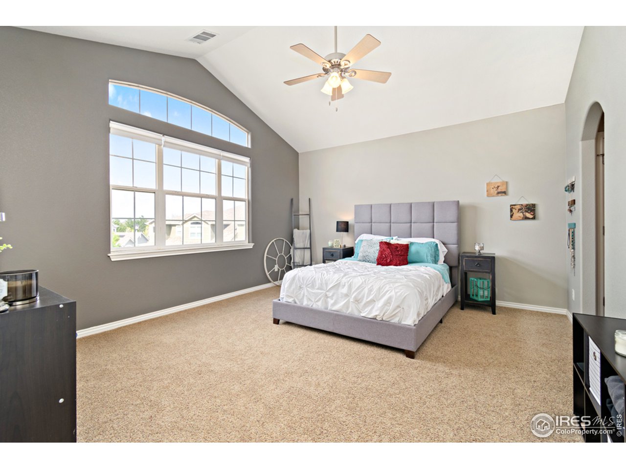 4672 West 20th Road, Unit 2123 Greeley, CO 80634 - Photo 13 of 25 Master Bedroom w/vaulted ceilings & plenty of natural light